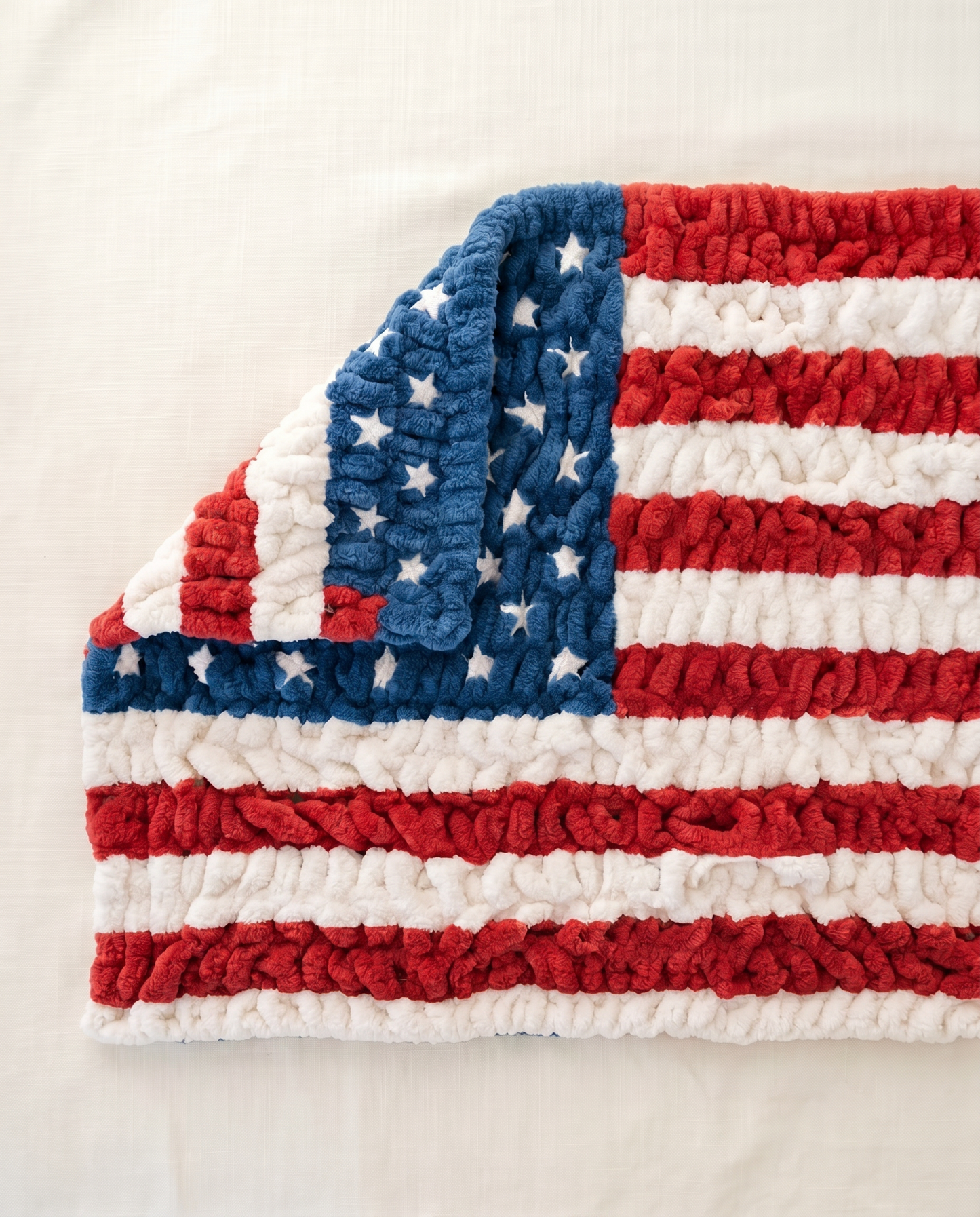Stars and stripes plush flag blanket flat lay